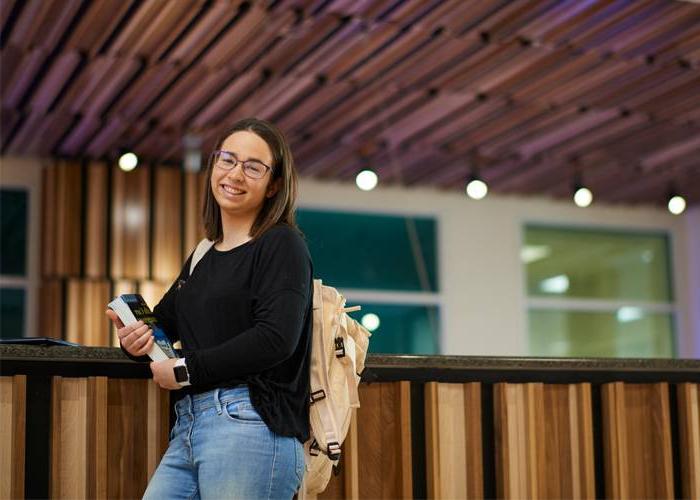 GVSU adult student at the library.